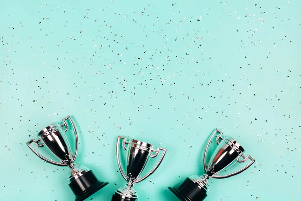 Silver Winner Cups Sparkles Mint Background Copy Space Festive Concept — Stock Photo, Image