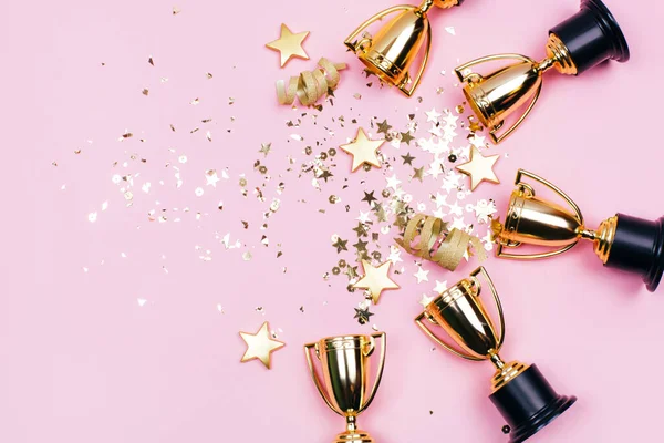 Golden Winner Cups Sparkles Pink Background Copy Space Festive Concept — Stock Photo, Image