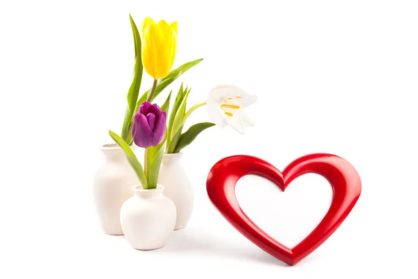 Heart photoframe and tulips — Stock Photo, Image