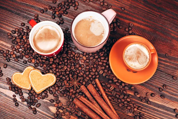 Three mugs full of hot coffee — Stock Photo, Image