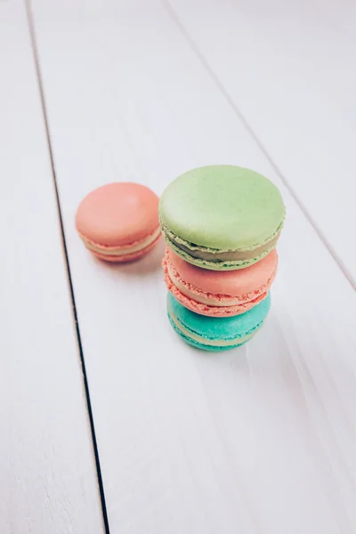 Macaroons on wooden table — Stock Photo, Image
