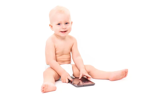 Ребёнок с цифровым планшетом — стоковое фото