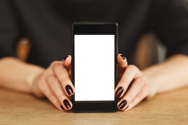 Woman holding a smartphone — Stock Photo, Image