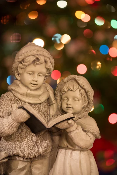 Natal Carolers com luzes - Vertical — Fotografia de Stock