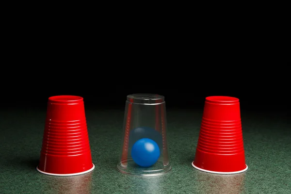 Blue Ball Hidden Under Clear Cup — Stock Photo, Image