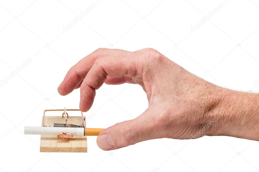 Hand Reaching for Cigarette in Mousetrap