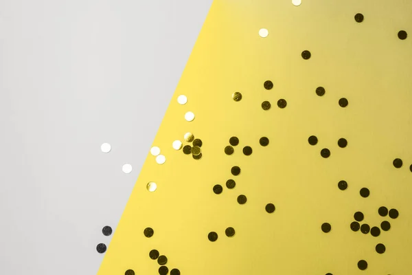 Podświetlające żółte i szare tło konfetti — Zdjęcie stockowe