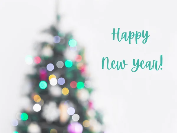 New year blurry christmas tree background on gray — Stock Photo, Image