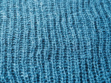 Mavi yün örülmüş süveter dokusu arka planı