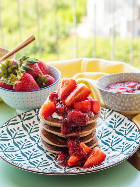 Vegan gluten free banana buckwheat pancakes served with dairy free yogurt and chia strawberry jam — Stock Photo, Image