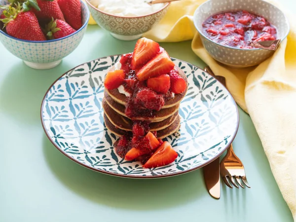 Vegan gluten free banana buckwheat pancakes served with dairy free yogurt and chia strawberry jam — Stock Photo, Image