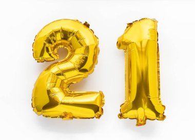 21 golden foil balloon numbers party decor on white background, birthday anniversary concept clipart