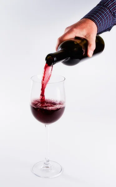 Pouring wine in glass — Stock Photo, Image