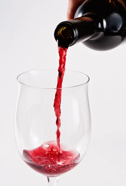 Pouring wine — Stock Photo, Image