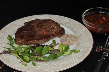 Cooked meat beef steak on the plate