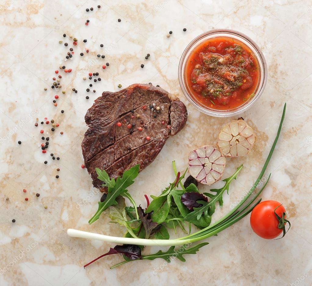 Cooked meat beef steak on the plate