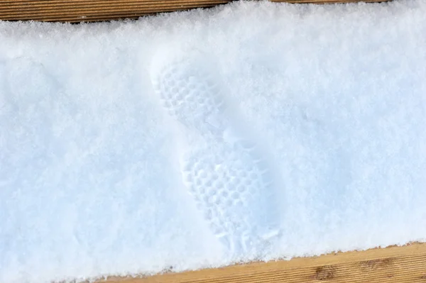 Spår i snön från boots — Stockfoto