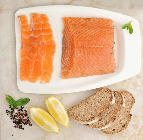 Salmon fillet cut into slices Stock Photo by ©forden 107411996