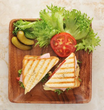 sandwiches with lettuce, ham, cheese, chicken breast, pickles clipart