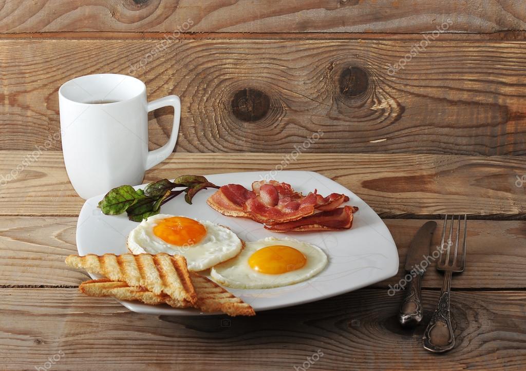 English Breakfast Scrambled Eggs Bacon Fried Toast And Tea Stock Photo Image By C Forden