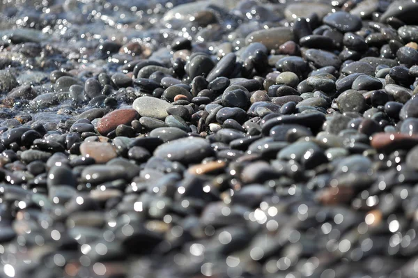 Abstract background - pebbles on the ocean — Stock Photo, Image