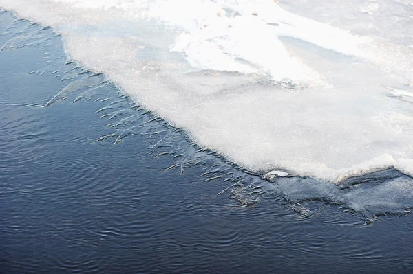 Frozen ice on the river - snow and ice hummocks — Stock Photo, Image