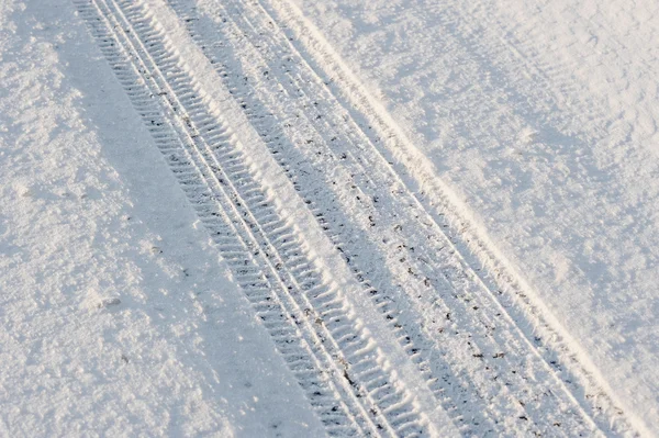 Fond abstrait - voiture de sentier dans la neige — Photo