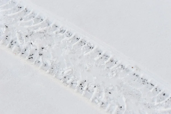 Fundo abstrato - carro trilha na neve — Fotografia de Stock