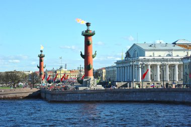 view of the arrow of Vasilevsky island and  snow-capped Rostral  clipart