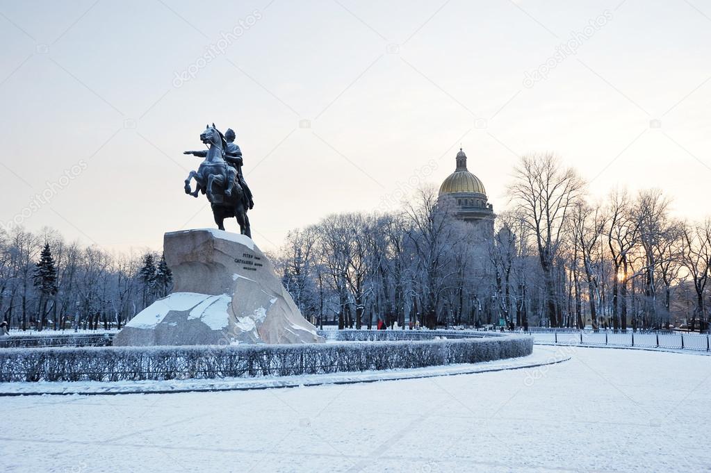 bronze horseman monument and St. Isaac's Cathedral on winter mor