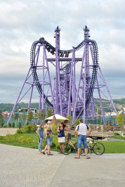SOCHI, RUSSIA - JUNE 28, 2015: attractions for children in popul clipart