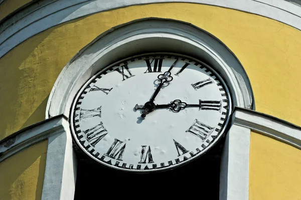 Wall antique clock on the wall of the town hall — Stock Photo, Image