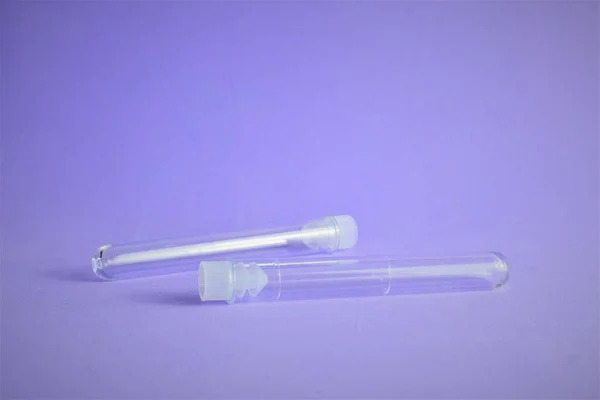 Test tubes with cap, on blue background