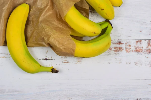 Zenith View Group Bananas Paper Bag White Rustic Table Copy — Stock Photo, Image