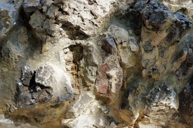 Large rocks of different shades and shapes. Background and copy space.