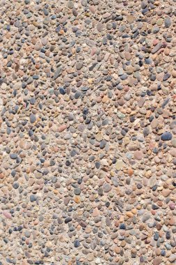Arka plan, küçük taşlarla, çeşitli renk tonlarıyla. Uzayı kopyala Üst görünüm.