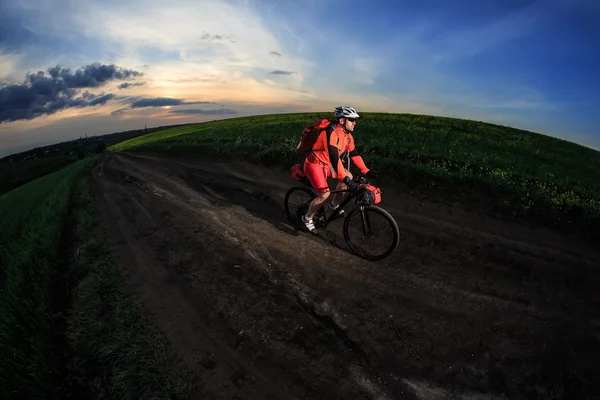 Young man is riding bicycle outside. Healthy Lifestyle. — Stock Photo, Image