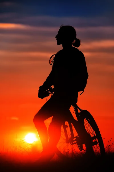 Silhouette of a bike on sky background — Stock Photo, Image