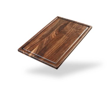 Koyu ahşap kesme tahtası beyaz üzerinde izole edilmiş.