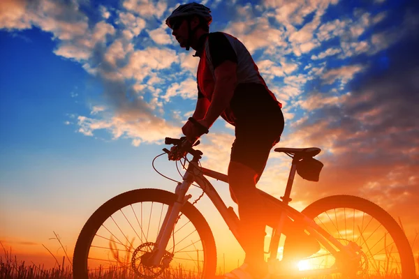 Biker in autumn on a sunny afternoon — Stock Photo, Image