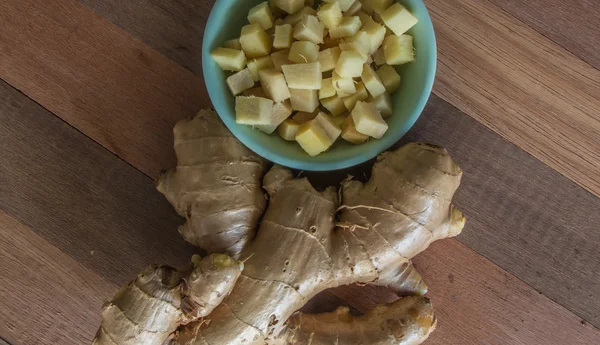 Ginger on a wooden table — Stock Photo, Image