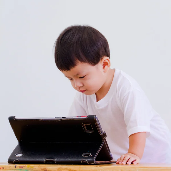 Little boy with digital tablet, early learning — Stock Photo, Image