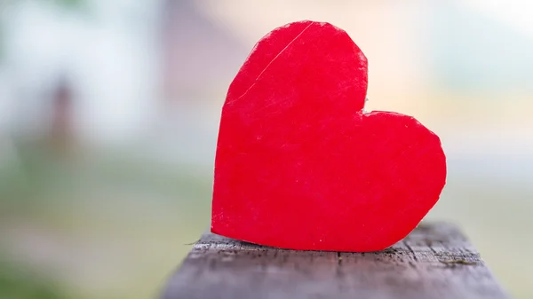 Red heart on wood — Stock Photo, Image