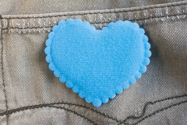 Blue heart on jeans background — Stock Photo, Image