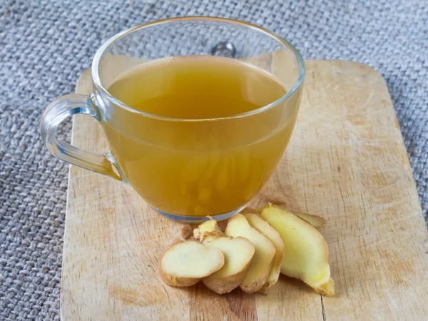 Ginger on wooden and ginger tea — Stock Photo, Image