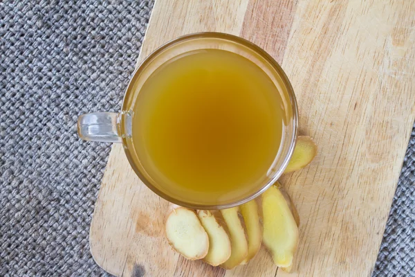 Ginger on wooden and ginger tea — Stock Photo, Image