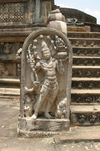 Polonnaruwa Sri Lanka Ancient ruins Statues at entrance to shrine beside stairs — Stock Photo, Image