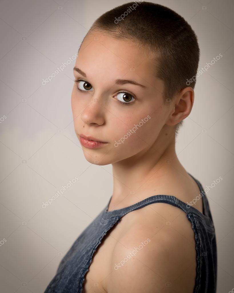 Beautiful Young Teenage Girl With Shaven Head Stock Photo by ©Heijo