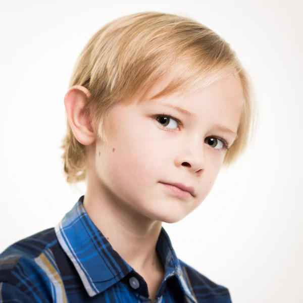 Bonito jovem menino no inteligente azul camisa — Fotografia de Stock