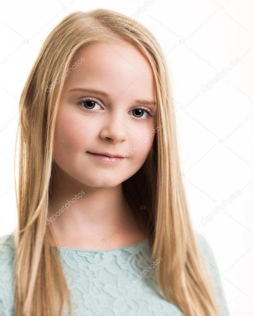 Blue Eyed Young Girl In Turquoise Top Isolated Stock Photo